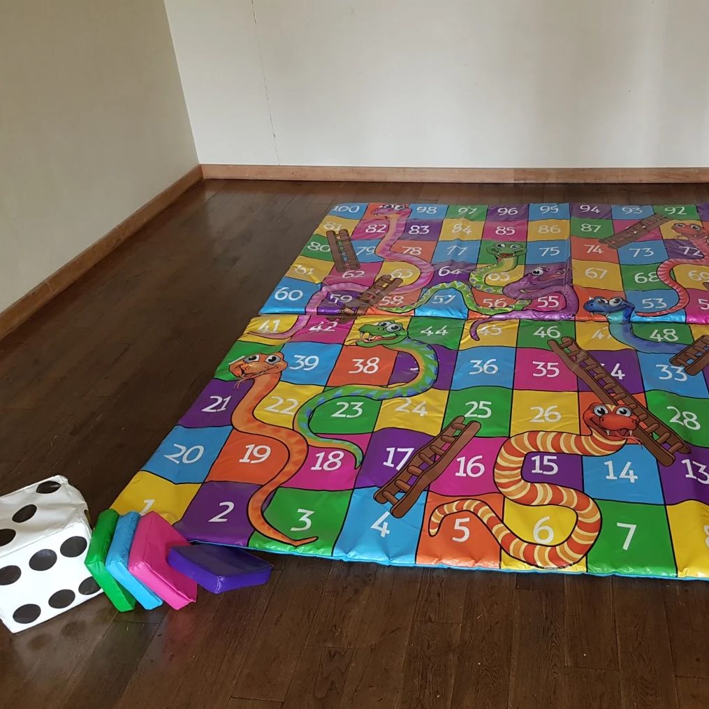Our Snakes & Ladders Giant Favourite game set up indoors for a Wedding.