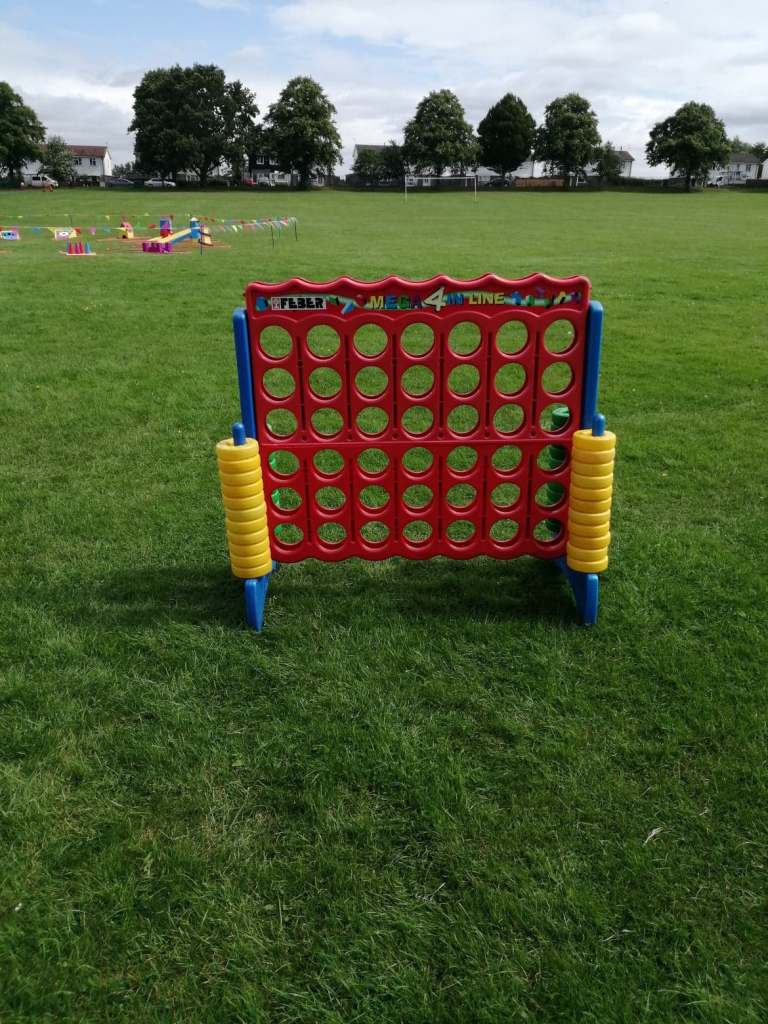 Our colourful Connect 4 game set up on the grass ready for a School Fete.
