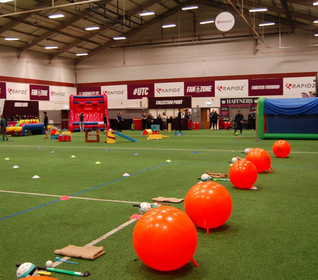 A School Sports Day event set up with Cone Markers, Space Hoppers, Crazy Golf and more.