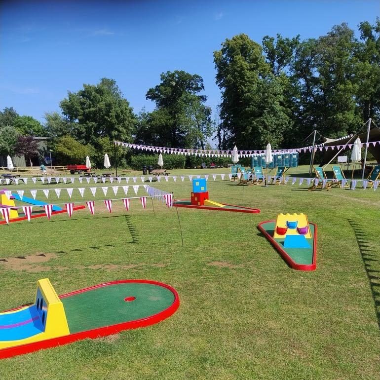 Beautifully set out Crazy Golf at a College Centenary Event.