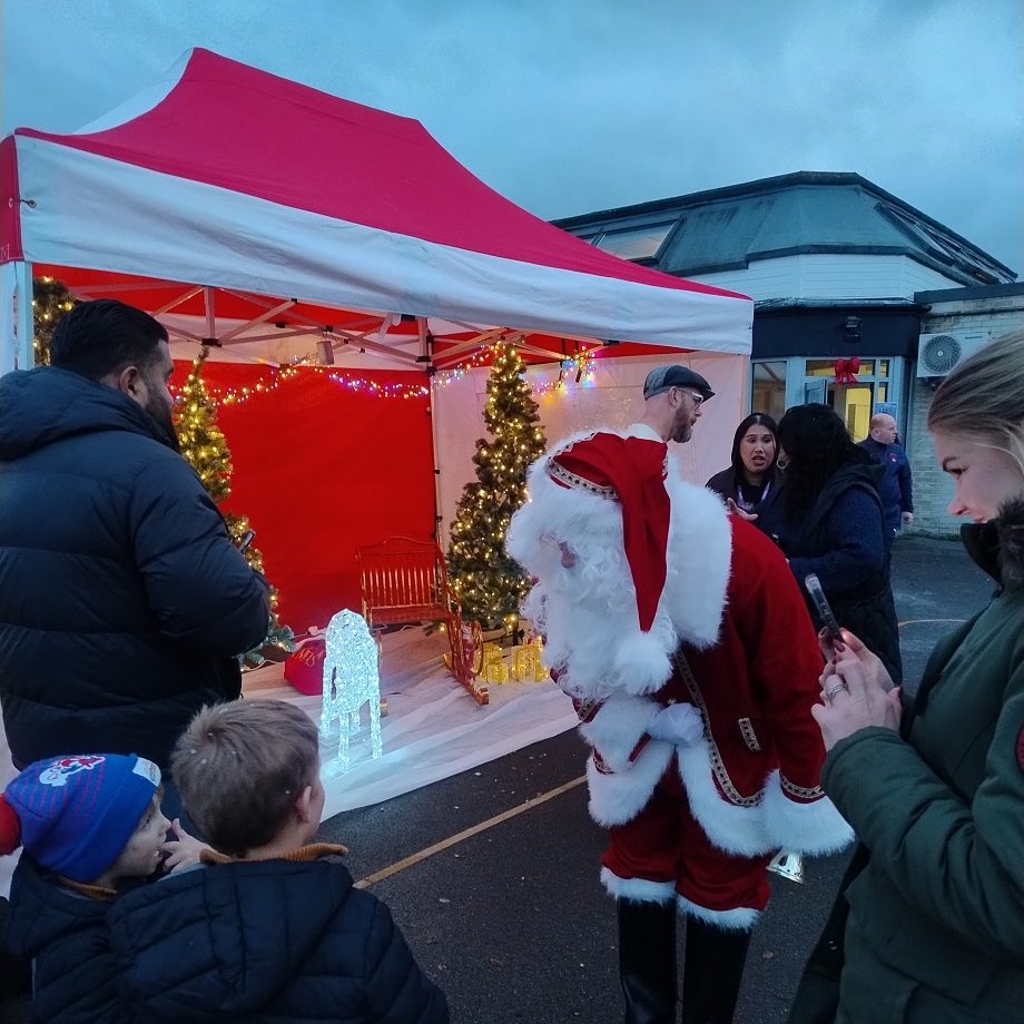Father Christmas greeting the children