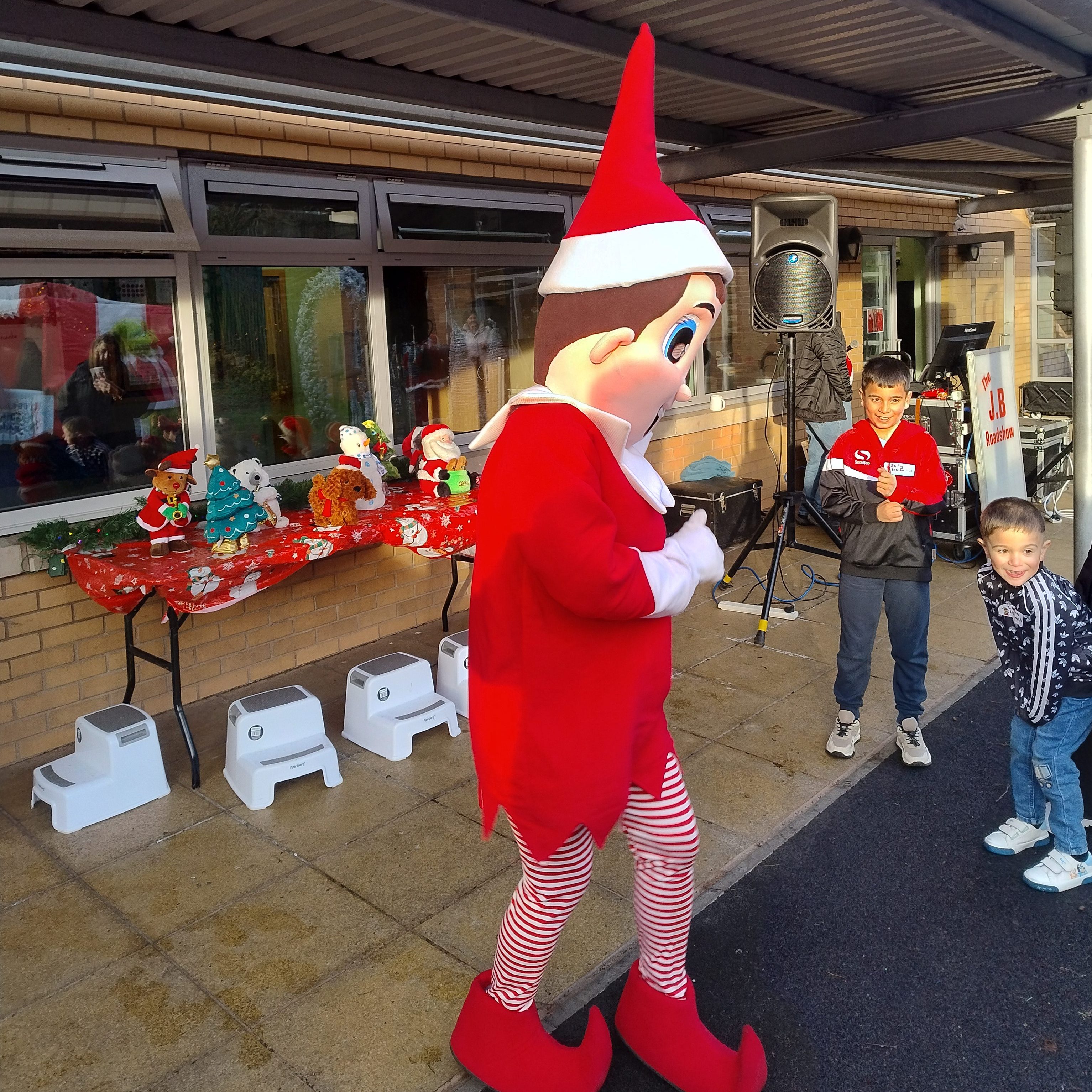 Outdoor Christmas Market with Elf Mascot